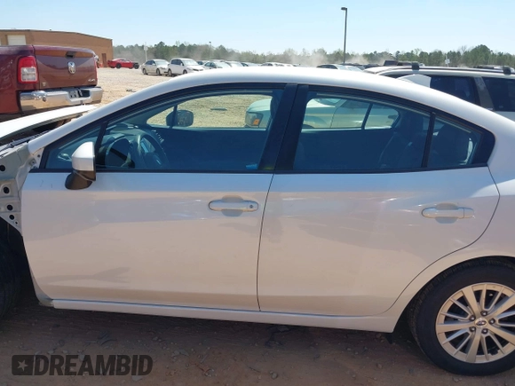 2017 Subaru Impreza Premium with VIN 4S3GKAB63H3617614, listed as a IAAI auction lot 41908948 with 102,722 mi miles and . Bid and sale history available at DreamBid. Image 14.