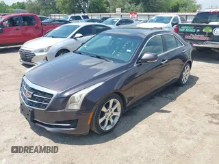 2015 Cadillac ATS Sedan Luxury RWD with VIN 1G6AB5RAXF0128099, listed as a IAAI auction lot 42133919 with 152,191 mi miles. Bid and sale history available at carsss.com. Image 2.