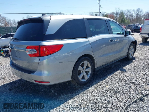 2018 Honda Odyssey EX-L with VIN 5FNRL6H75JB092633, listed as a IAAI auction lot 41971589 with 103,099 mi miles and . Bid and sale history available at DreamBid. Image 4.