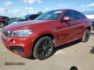 2018 BMW X6 xDrive50i with VIN 5UXKU6C54J0W38887, listed as a Copart auction lot 73731154 with 42,560 mi miles and Clean Title. Bid and sale history available at carsss.com. Image 1.