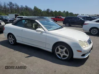 2005 Mercedes-Benz CLK 500 with VIN WDBTK75G35T037649, listed as a Copart auction lot 66212825 with 107,716 mi miles and Salvage title. Bid and sale history available at DreamBid. Image 4.