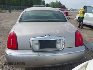 2001 Lincoln Town Car Signature with VIN 1LNHM82W21Y684197, listed as a IAAI auction lot 41944429 with 159,297 mi miles and . Bid and sale history available at DreamBid. Image 16.