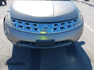 2004 Nissan Murano SL z VIN JN8AZ08T94W204232, wystawiony jako IAAI lot #42239543 z przebiegiem Nie podano mil oraz . Historia ofert i sprzedaży dostępna na DreamBid. Obrazek 11.