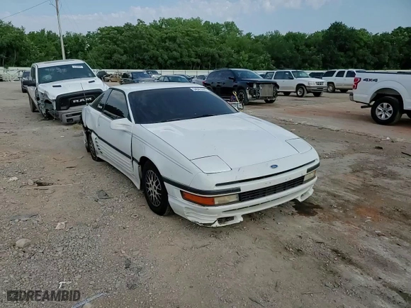 1990 Ford Probe GL with VIN 1ZVPT20CXL5212307, listed as a Copart auction lot 54941994 with NaN miles and Salvage Title. Bid and sale history available at carsss.com. Image 11.