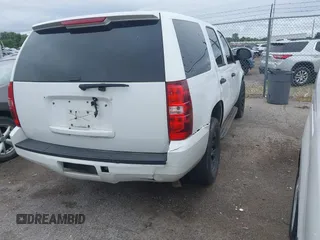 2012 Chevrolet Tahoe Commercial with VIN 1GNLC2E02CR322901, listed as a IAAI auction lot 42679887 with 251,794 mi miles and . Bid and sale history available at DreamBid. Image 4.