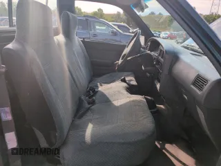 1994 Toyota Pickup DX with VIN JT4RN81PXR5174113, listed as a Copart auction lot 64211905 with 209,694 mi miles and Salvage title. Bid and sale history available at DreamBid. Image 7.