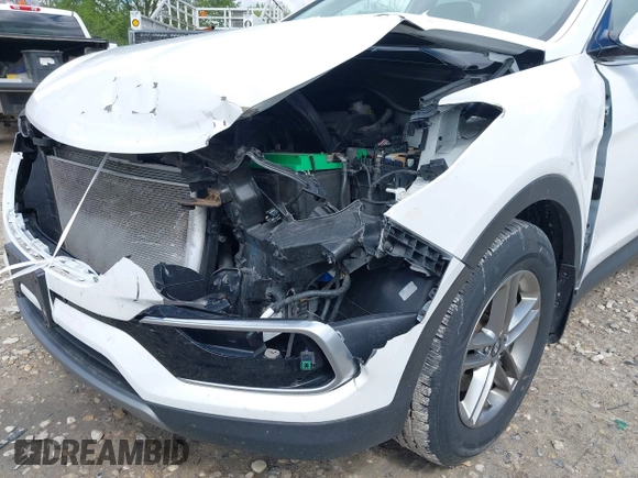 2018 Hyundai Santa Fe 2.4L z VIN 5NMZUDLB1JH101842, wystawiony jako IAAI lot #42302237 z przebiegiem 97 376 mil mil oraz . Historia ofert i sprzedaży dostępna na DreamBid. Obrazek 6.