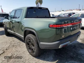 2023 Rivian R1T Adventure z VIN 7FCTGAAA9PN018171, wystawiony jako Copart lot #72593614 z przebiegiem 12 553 mil mil oraz Szkody całkowita. Historia ofert i sprzedaży dostępna na DreamBid. Obrazek 2.