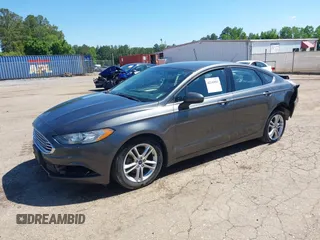 2018 Ford Fusion SE z VIN 3FA6P0H71JR155221, wystawiony jako IAAI lot #42145081 z przebiegiem 189 367 mil mil oraz . Historia ofert i sprzedaży dostępna na DreamBid. Obrazek 18.
