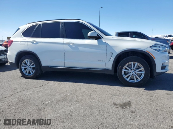 2015 BMW X5 xDrive35i z VIN 5UXKR0C50F0K62596, wystawiony jako Copart lot #45988185 z przebiegiem 128 771 mil mil oraz Szkoda całkowita • Salvage title. Historia ofert i sprzedaży dostępna na DreamBid. Obrazek 4.