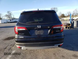 2021 Honda Pilot Touring 8-Passenger with VIN 5FNYF5H94MB039974, listed as a Copart auction lot 82654964 with 54,048 mi miles and Salvage Title. Bid and sale history available at DreamBid. Image 6.