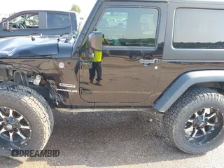 2017 Jeep Wrangler Sport with VIN 1C4AJWAG6HL654592, listed as a IAAI auction lot 42447379 with 61,585 mi miles and . Bid and sale history available at DreamBid. Image 17.