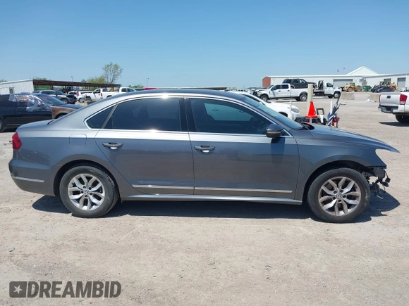 2017 Volkswagen Passat S z VIN 1VWAT7A37HC069014, wystawiony jako IAAI lot #41967310 z przebiegiem 109 266 mil mil oraz . Historia ofert i sprzedaży dostępna na DreamBid. Obrazek 13.