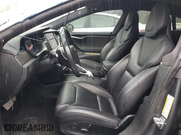 2019 Tesla Model S 100D with VIN 5YJSA1E49KF300356, listed as a Copart auction lot 43312715 with 81,915 mi miles and Salvage title. Bid and sale history available at DreamBid. Image 7.