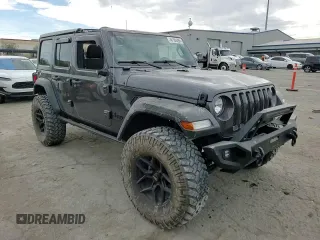 2022 Jeep Wrangler Unlimited Sport with VIN 1C4HJXDG6NW133687, listed as a Copart auction lot 46189285 with 15,083 mi miles and Salvage Title. Bid and sale history available at DreamBid. Image 12.