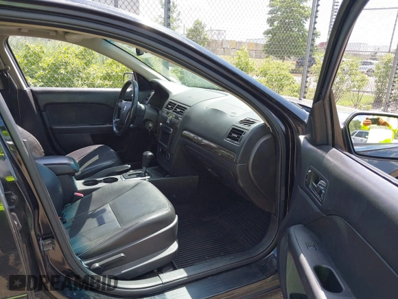 2009 Mercury Milan Premier with VIN 3MEHM02179R600636, listed as a IAAI auction lot 42638488 with 183,743 mi miles and . Bid and sale history available at DreamBid. Image 5.