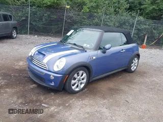 2006 MINI Convertible S z VIN WMWRH33516TL93102, wystawiony jako IAAI lot #42529434 z przebiegiem 123 292 mil mil oraz . Historia ofert i sprzedaży dostępna na DreamBid. Obrazek 2.