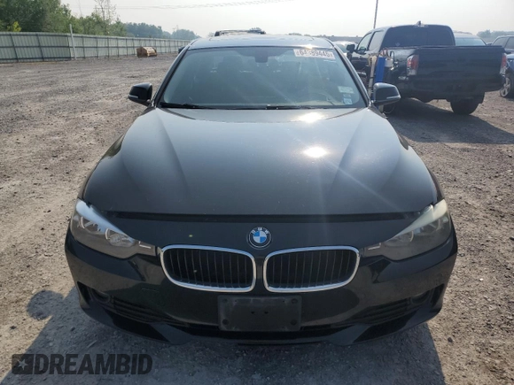 2013 BMW 3 Series 320i xDrive with VIN WBA3C3C56DF979701, listed as a Copart auction lot 64389445 with 226,125 mi miles and Salvage title. Bid and sale history available at DreamBid. Image 5.