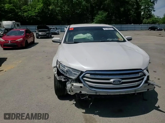 2015 Ford Taurus SEL z VIN 1FAHP2E82FG108442, wystawiony jako Copart lot #57790515 z przebiegiem 116 834 mil mil oraz Szkoda całkowita • Salvage title. Historia ofert i sprzedaży dostępna na DreamBid. Obrazek 13.