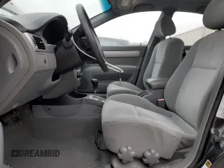 2005 Suzuki Forenza S z VIN KL5JD56Z65K100830, wystawiony jako Copart lot #85256494 z przebiegiem 74 543 mil mil oraz Tytuł czysty. Historia ofert i sprzedaży dostępna na DreamBid. Obrazek 7.