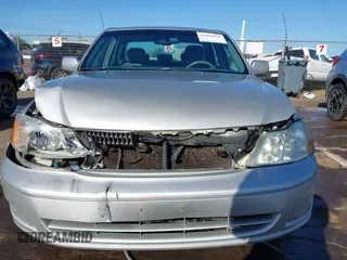 2001 Toyota Avalon XL z VIN 4T1BF28B51U189775, wystawiony jako IAAI lot #41970356 z przebiegiem 247 969 mil mil oraz . Historia ofert i sprzedaży dostępna na DreamBid. Obrazek 6.