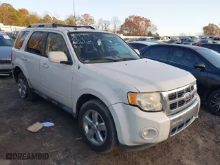 2011 Ford Escape Limited with VIN 1FMCU0E72BKA06425, listed as a IAAI auction lot 41095359 with 174,075 mi miles. Bid and sale history available at carsss.com. Image 1.