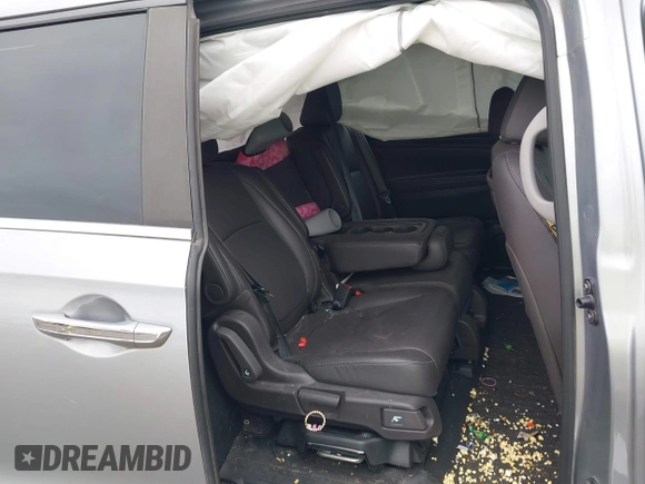 2021 Honda Odyssey Touring with VIN 5FNRL6H82MB009480, listed as a IAAI auction lot 41728056 with 84,577 mi miles. Bid and sale history available at carsss.com. Image 8.