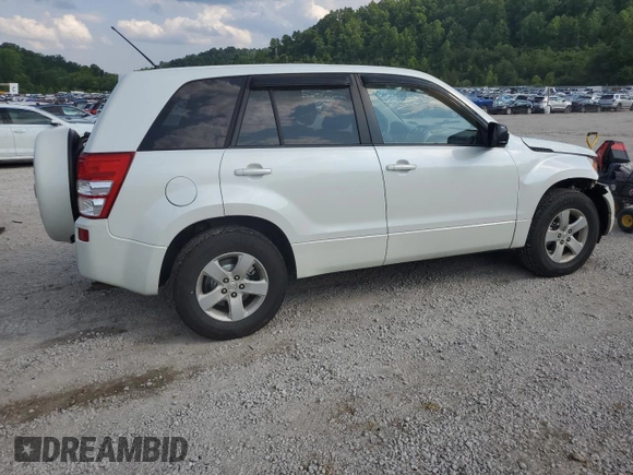 2010 Suzuki Grand Vitara Premium z VIN JS3TD0D24A4100983, wystawiony jako Copart lot #60311295 z przebiegiem 104 455 mil mil oraz Szkoda całkowita • Salvage title. Historia ofert i sprzedaży dostępna na DreamBid. Obrazek 3.