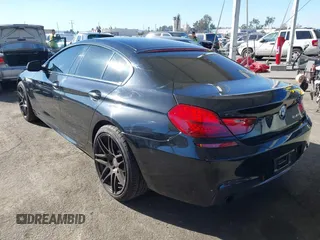 2015 BMW 6 Series 640i with VIN WBA6A0C52FGB53591, listed as a IAAI auction lot 41247695 with 81,828 mi miles and . Bid and sale history available at DreamBid. Image 3.