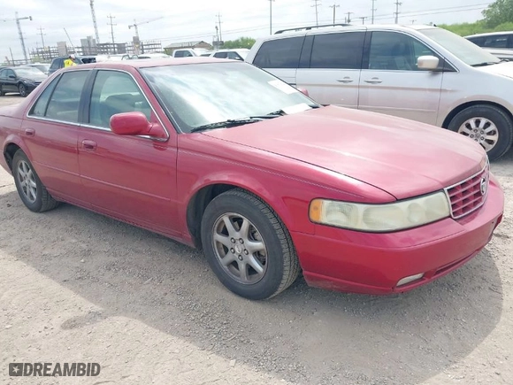 2004 Cadillac Seville Luxury SLS with VIN 1G6KS54Y84U124826, listed as a IAAI auction lot 41933620 with 158,535 mi miles. Bid and sale history available at carsss.com. Image 1.