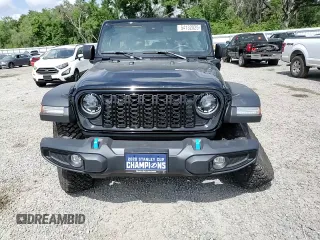 2024 Jeep Wrangler Willys z VIN 1C4RJXN62RW204366, wystawiony jako Copart lot #54132025 z przebiegiem 2 701 mil mil oraz Szkoda całkowita • Salvage title. Historia ofert i sprzedaży dostępna na DreamBid. Obrazek 14.