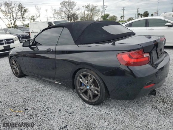 2015 BMW 2 Series M235i with VIN WBA1M1C54FV393578, listed as a Copart auction lot 88945735 with 95,713 mi miles and Salvage Title. Bid and sale history available at carsss.com. Image 2.