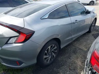 2017 Honda Civic Coupe LX with VIN 2HGFC4B5XHH307783, listed as a IAAI auction lot 41835385 with 113,018 mi miles. Bid and sale history available at carsss.com. Image 4.