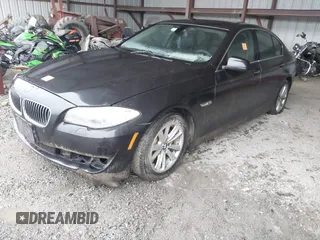 2013 BMW 5 Series 528i xDrive with VIN WBAXH5C50DD113566, listed as a IAAI auction lot 41981416 with 123,330 mi miles. Bid and sale history available at carsss.com. Image 2.
