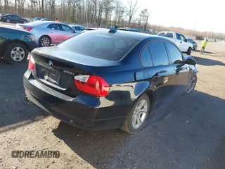 2008 BMW 3 Series 328i with VIN WBAVA37568NL55529, listed as a IAAI auction lot 41832053 with 134,933 mi miles. Bid and sale history available at carsss.com. Image 4.