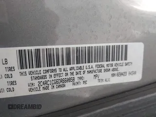 2013 Chrysler Town & Country Touring L with VIN 2C4RC1CG6DR660858, listed as a IAAI auction lot 41970976 with 140,299 mi miles and . Bid and sale history available at DreamBid. Image 9.