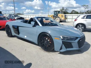2020 Audi R8 z VIN WUAVECFX5L7901778, wystawiony jako Copart lot #74736714 z przebiegiem Nie podano mil oraz Nie do naprawy. Historia ofert i sprzedaży dostępna na DreamBid. Obrazek 4.