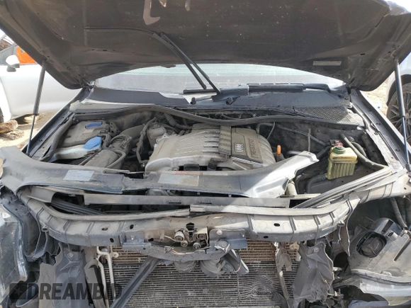 2009 Audi Q7 z VIN WA1AY74L59D008525, wystawiony jako Copart lot #76812104 z przebiegiem 218 747 mil mil oraz Szkoda całkowita • Salvage title. Historia ofert i sprzedaży dostępna na DreamBid. Obrazek 13.