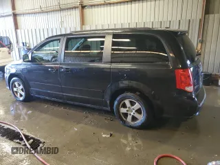 2012 Dodge Grand Caravan SXT with VIN 2C4RDGCG0CR340868, listed as a Copart auction lot 85560274 with 242,089 mi miles and Clean Title. Bid and sale history available at DreamBid. Image 2.