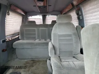 1999 Chevrolet Express z VIN 1GBFG15R9X1089305, wystawiony jako Copart lot #51810075 z przebiegiem 130 441 mil mil oraz Szkoda całkowita • Salvage title. Historia ofert i sprzedaży dostępna na DreamBid. Obrazek 10.