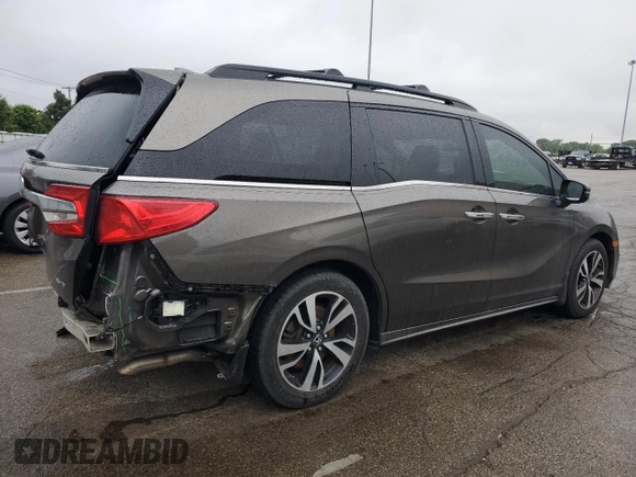 2018 Honda Odyssey Elite z VIN 5FNRL6H94JB107589, wystawiony jako Copart lot #58347385 z przebiegiem 98 761 mil mil oraz Szkoda całkowita • Salvage title. Historia ofert i sprzedaży dostępna na DreamBid. Obrazek 3.