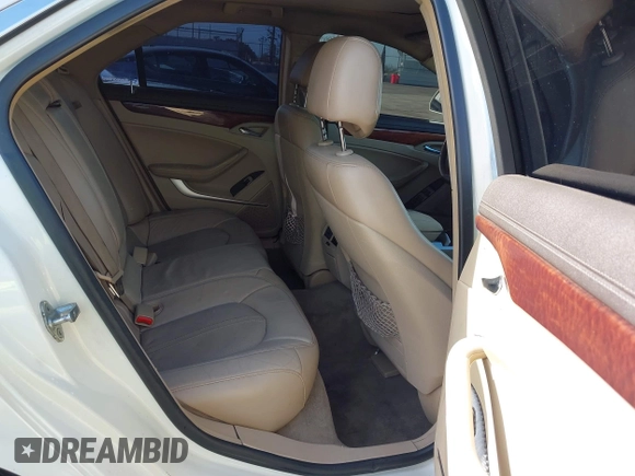 2010 Cadillac CTS with VIN 1G6DK5EVXA0102844, listed as a IAAI auction lot 41818267 with 127,517 mi miles and . Bid and sale history available at DreamBid. Image 8.