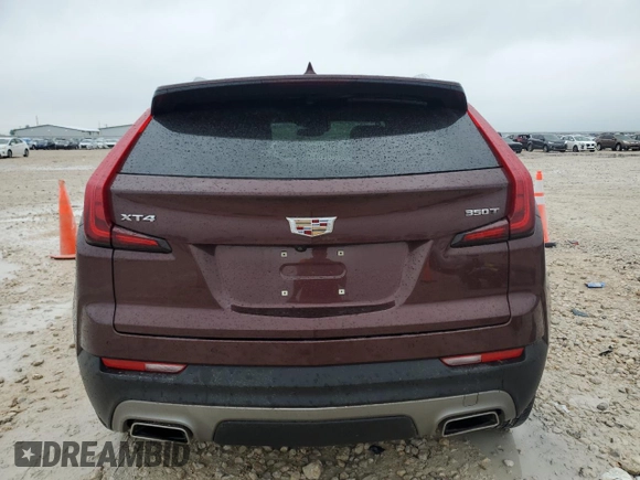 2023 Cadillac XT4 FWD Premium Luxury with VIN 1GYFZCR48PF100078, listed as a Copart auction lot 55955865 with 23,509 mi miles and Salvage title. Bid and sale history available at DreamBid. Image 6.