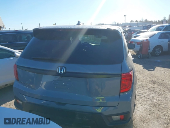 2022 Honda Passport EX-L with VIN 5FNYF7H57NB005716, listed as a IAAI auction lot 41078499 with 33,141 mi miles and . Bid and sale history available at DreamBid. Image 16.