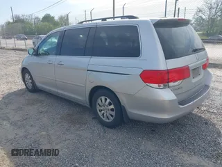2010 Honda Odyssey EX with VIN 5FNRL3H43AB025629, listed as a IAAI auction lot 42095744 with 209,722 mi miles and . Bid and sale history available at DreamBid. Image 3.