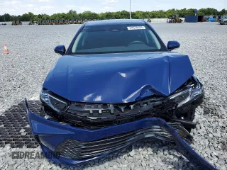 2025 Toyota Camry LE with VIN 4T1DAACK0SU075581, listed as a Copart auction lot 54570525 with 2,329 mi miles and Non Repairable. Bid and sale history available at DreamBid. Image 5.