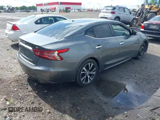 2017 Nissan Maxima SL z VIN 1N4AA6AP3HC441685, wystawiony jako IAAI lot #42236439 z przebiegiem 175 931 mil mil oraz . Historia ofert i sprzedaży dostępna na DreamBid. Obrazek 4.