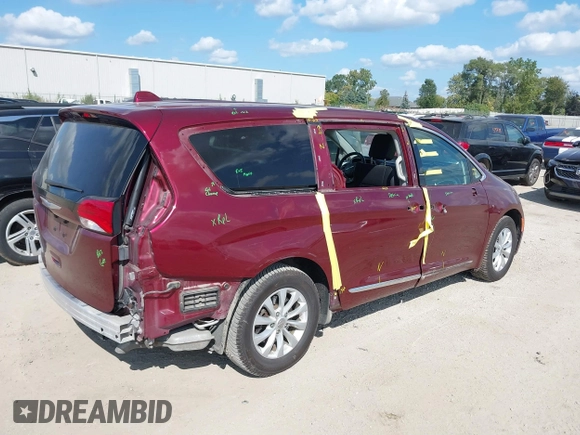 2018 Chrysler Pacifica Touring L with VIN 2C4RC1BG0JR279665, listed as a IAAI auction lot 40336389 with 80,835 mi miles and . Bid and sale history available at DreamBid. Image 4.