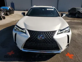 2021 Lexus UX 250h с VIN JTHP9JBH5M2041312, выставлен на аукционе Copart как лот 50294735 с пробегом 7 910 миль миль и Списание • Salvage title. История ставок и продаж доступна на DreamBid. Изображение 5.