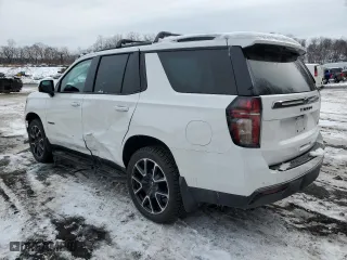 2021 Chevrolet Tahoe RST with VIN 1GNSKRKD7MR311702, listed as a Copart auction lot 44184065 with 47,584 mi miles and Salvage Title. Bid and sale history available at carsss.com. Image 2.
